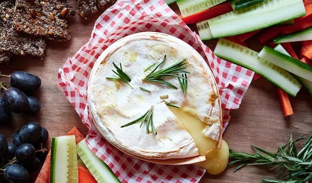 Baked camembert with crudites and seed crackers